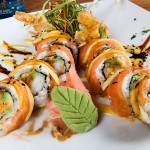 Japengo Roll – Cream cheese, avocado and shrimp; topped with salmon and avocado.