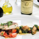 Photo.- page 74 | Francisco Estrada – caption: The catch of the day is artfully presented at Alcaravea Gourmet