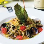 Photo.- Page 64 | Francisco Estrada – Caption: the sea’s abundance is celebrated with this pasta vongole. 