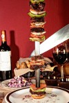     Photo:  - page 87 | Gilda Badillo     Caption: For a taste of South America,     head to Madeira Bistro. Pictured: beef     skewer with bell peppers, onion, and     tomato.