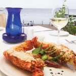Photo.- page 73 | Miguel Ventura – Caption: The stuffed lobster at Baja Cantina Beach Club is a seafood lover's delight.