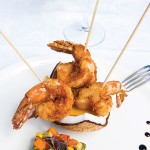 Photo: - page 69 | Francisco Estrada – Caption: For a tropical bite, try the coconut shrimp at Baja Cantina Beach.