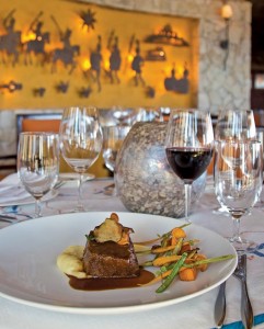 From left: The braised short rib at De Cortez Mesquite Grill is served in a pasilla chile sauce along with truffled mashed potatoes, organic vegetables, and cashew nuts. Photo by CaboPictures.com