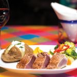 Photo.- page 80 | Hugo Román - Caption: El Coral endures because of a flavor-first menu featuring dishes like this seared tuna.
