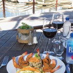 Photo.- page 82 | Miguel Ventura – caption: You’ll treasure the dishes at Jack’s Bar & Grill, like this butterfly shrimp with rice and veggies