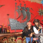 Photo.- page 80 | Miguel Ventura – Caption: Diners at Jack's Bar & Grill are treated to a pirate-themed adventure.