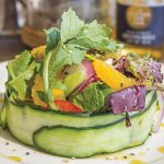Photo.- page 82 | Raynnier Gallegos – Caption: The menu at Jack's Bar & Grill continues to evolve with increasingly elevated fare.