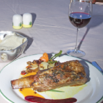 Photo.- page 86 | Miguel Ventura – Caption: Los Deseos celebrates traditional flavors with dishes like this short rib baked with herbs and hibiscus sauce