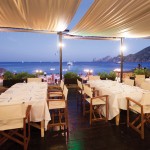 Photo.- page 70 | Francisco Estrada – Caption: The romantic setup at Baja Cantina Beach Club is perfect for date night or celebrating a special occasion.