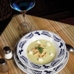Photo.- page 83 | Francisco Estrada – Caption: The poblano soup at Los Deseos is topped with fresh cheese and tortilla soup strips.