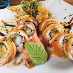Photo: - page 93 | Francisco Estrada – Caption: The Solomon's Landing sushi menu features many winners, including this salmon roll.