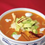 Photo.- page 76 | Miguel Ventura – Caption: There's nothing so comforting as a steaming bowl of tortilla soup at Campestre Restaurant Bar.