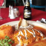 Photo.- Page 74 | Miguel ventura – Caption: The home-style cookin at Campestre includes dishes like chile relleno.