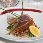 Photo.- page 86 | Miguel Ventura – Caption: The seared tuna at La Panga Antigua comes crusted with pumpkin seeds and dried chiles.