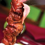     Photo:  - page 93 | Carlos Aboyo  –  Caption: One-year-old Rodizio Grill     is the latest South American eatery     to arrive in Cabo San Lucas.
