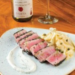 Photo.- page 72 | Francisco Estrada – Caption: The crusted steak at Romeo & Julieta is beautifully presented.