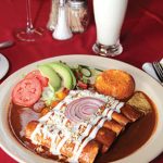 Photo.- Page 74 | Miguel Ventura – Caption: For some local flavor, try the enchiladas at Campestres.