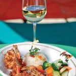 Photo: - page 82 | Carlos Aboyo – Caption: Mango Deck offers fancier fare like coconut shrimp.
