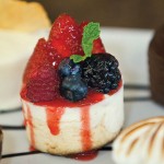 Photo: - page 92 | CaboPictures.com – The desserts at Señor Sweets are a delicious as you might expect. Pictured: cheesecake with berries.