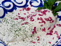 Chile en Nogada.- A specialty dish to celebrate independence day. Roasted and peeled Poblano pepper stuffed with sautéed meat, seeds and dried fruit; served with afresh cold walnut & sherry cream sauce. One of Mexico's finest.