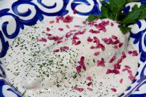 Chile en Nogada.- A specialty dish to celebrate independence day. Roasted and peeled Poblano pepper stuffed with sautéed meat, seeds and dried fruit; served with afresh cold walnut & sherry cream sauce. One of Mexico's finest.