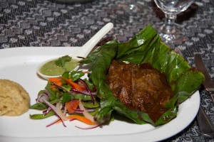 Leg of Lamb wrapped in banana leaf.
