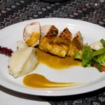 Chicken with green pepper sauce.