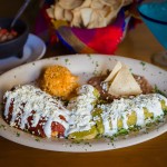 Mexican Combo: Chili Relleno, chicken, enchilada, and tomate rice and beans. 