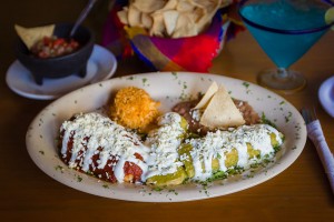 Mexican Combo: Chili Relleno, chicken, enchilada, and tomate rice and beans. 