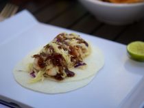 Grilled shrimp taco on jicama tortilla.