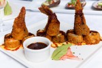 Ebi Nagasaki – Shrimp, Stuffed with Crab salad and salmon lightly breaded with mango and chipotle sauce