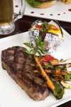 Photo: - page 72 | Francisco Estrada • Caption: Enjoy a hearty steak dinner with a baked potato and vegetables at Baja Cantina Beach.