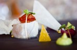 Cured Seabass Ceviche – Sea Bass ceviche with, avocado, pearl onions, tomato, coriander, citric wedgesrice chips and jícama. With an emulsion of chipotle chili