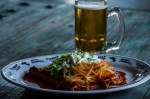 Enchiladas Mineras – Enchiladas de queso panela fresco, con salsa de chile guajillo acompaãdas de papa, zanahoria, lechuga, crema y queso cotija.