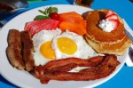     Two, two, two, two – (Breakfast of champions) 2 eggs any style, 2 pancakes or French Toast pieces, 2 sausages, 2 strips of bacon