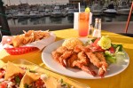 breaded shrimp with salad and rice.