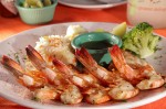  Grilled jumbo shrimp served with rice & vegetables