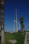 Two CFE teams work on repairing lines on Highway 1 near Soriana Plaza, Cabo San Lucas