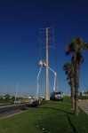 Two CFE teams work on repairing lines on Highway 1 near Soriana Plaza, Cabo San Lucas