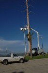 Two CFE teams work on repairing lines on Highway 1 near Soriana Plaza, Cabo San Lucas