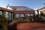 The work is underway to repair damage at Hacienda del Cayote Restaurant