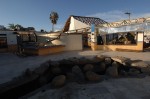 The work is underway to repair damage at Hacienda del Cayote Restaurant
