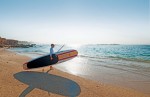 Rise early for a morning session of stand-up paddle in Chileno Bay.