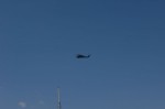 Policia Federal helicopter flying over the Cabo San Lucas marina.