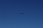 Policia Federal helicopter flying over the Cabo San Lucas marina.