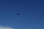 Policia Federal helicopter flying over the Cabo San Lucas marina.